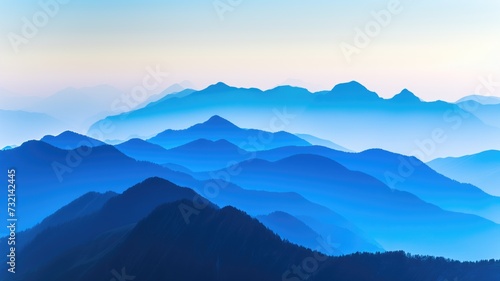 Serene blue layers of mountains fading into the horizon at dusk