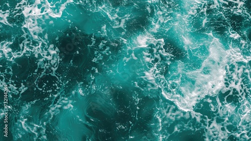 Turbulent seafoam green waters churn vigorously, showcasing the dynamic power of the ocean © Татьяна Макарова