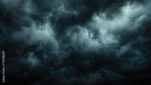 Dark storm clouds with a glimpse of light