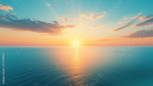 Serene sunset over the ocean, clouds reflecting on calm water © Татьяна Макарова