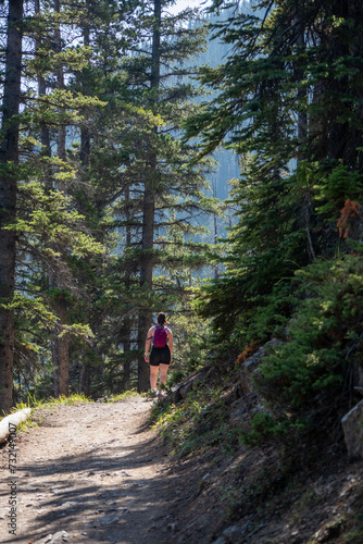 woman walking in the woods