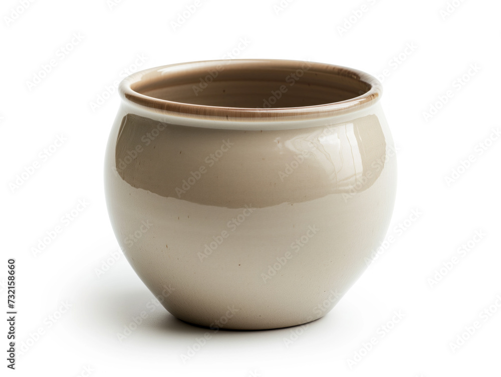 An empty cream ceramic flowerpot is isolated on a white background An empty cream ceramic flowerpot is isolated on a white background