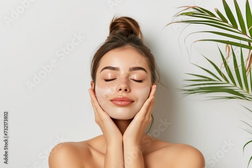 Skincare Model skin care expert. Well groomed woman uses oxygen infusion, micellar water lip balm, lotion & eye patch. Face cream vesiculopustular rashes childhood jar anti aging skincare method pot photo