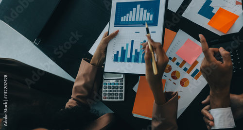 Fotografie Business team collaboration discussing working analyzing with financial data and marketing growth report graph in team, presentation and brainstorming to strategy planning making profit of company