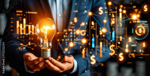 Business Innovation and Financial Growth, Hand Holding Light Bulb with Money Symbols, Creative Ideas in Economy and Finance