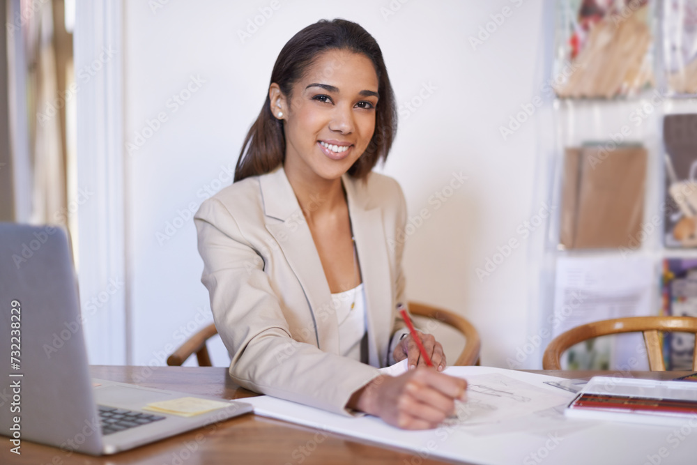 Fashion designer, business and portrait of happy woman drawing on paper with pencil in startup office. Creative, person or face of tailor at desk, professional or employee working on sketch in Brazil Fashion designer, business and portrait of happy woman drawing on paper with pencil in startup office. Creative, person or face of tailor at desk, professional or employee working on sketch in Brazil