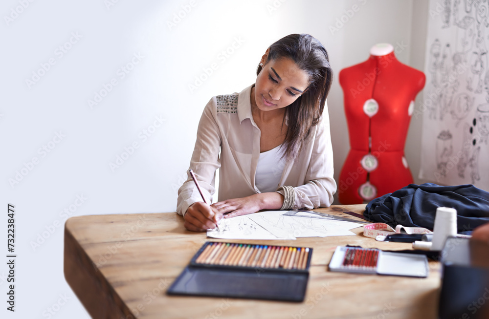 Fashion designer, woman and drawing on paper with pencil in startup office of small business. Creative, person or tailor sketch at desk for project, planning or writing draft of ideas for clothes Fashion designer, woman and drawing on paper with pencil in startup office of small business. Creative, person or tailor sketch at desk for project, planning or writing draft of ideas for clothes