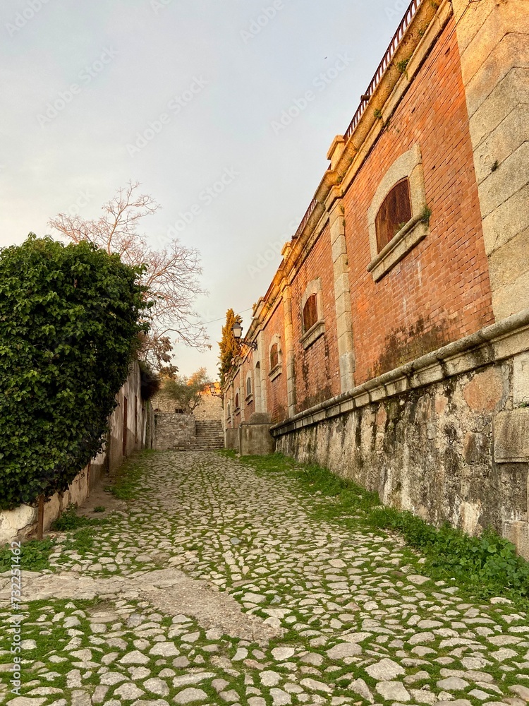 Stone street and brick building in Trujillo, Extremadura, Spain
