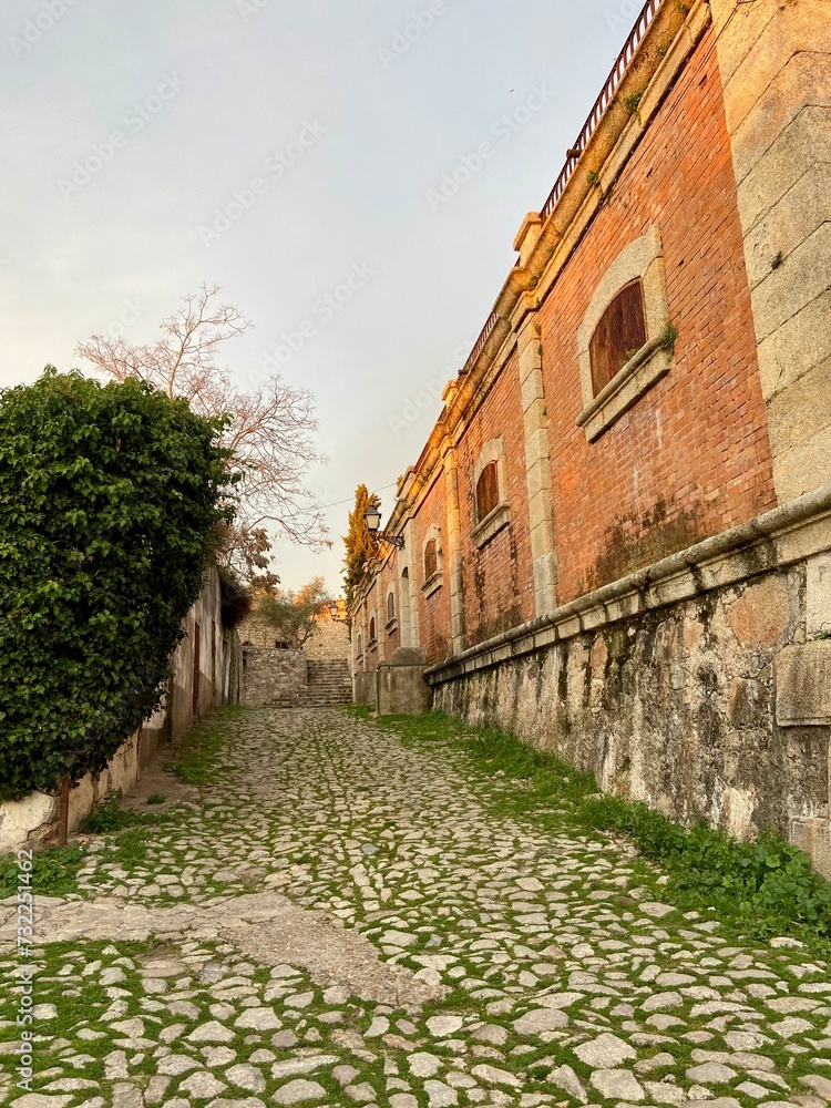 Stone street and brick building in Trujillo, Extremadura, Spain Stone street and brick building in Trujillo, Extremadura, Spain
