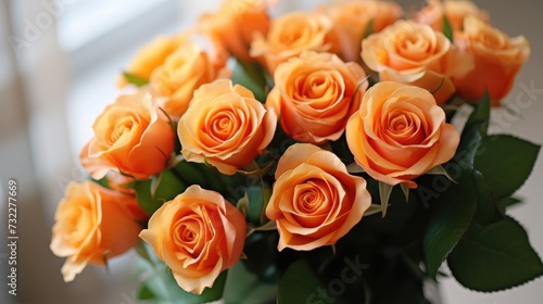 A bouquet of yellow  orange roses for congratulations on Mother s Day  Valentine s Day  Women s Day. Blurred background.