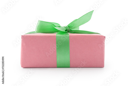 Pink paper present box with green ribbon bow isolated on white background