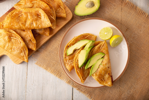 Pescadillas. So called when they are stuffed with fish such as tuna, popular during the Lent season. They are known as Golden Quesadillas when they are filled with ingredients such as meat or potatoes photo