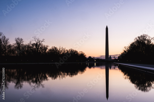 Washington Monument in silhouette on winter morning.
