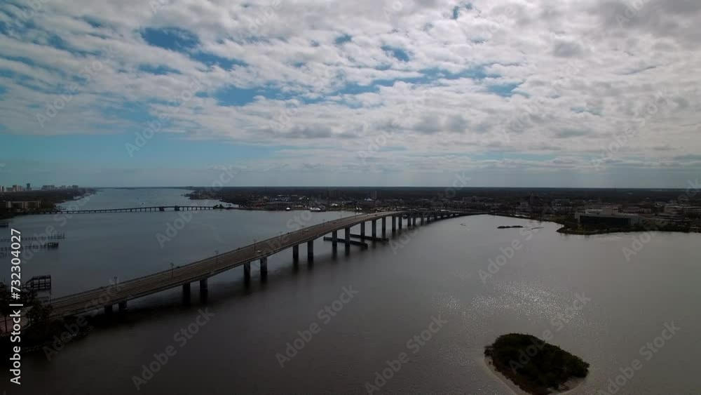 Aerial Panning Scenic View Of Broadway Bridge Over River In Residential City On Sunny Day - Daytona Beach , Florida Aerial Panning Scenic View Of Broadway Bridge Over River In Residential City On Sunny Day - Daytona Beach , Florida