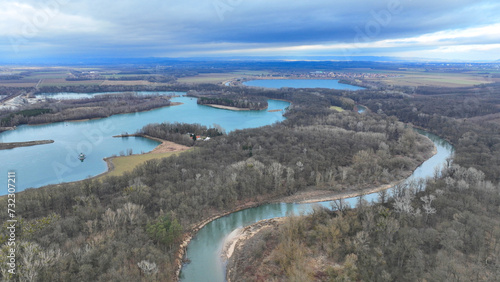 River floodplain winter delta Zastudanci meander drone aerial inland video shot in sandy sand alluvium freezing cold national nature reserve, benches forest and lowlands wetland swamp, view flying fly photo