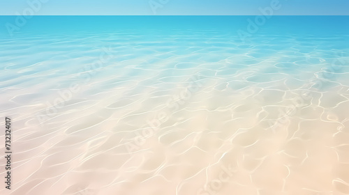 Sandy beach with light blue transparent water waves and sunlight, tranquil aerial beach scene © jiejie