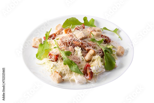 Plate with Traditional Caesar Salad with Chicken and Bacon isolated on White Background