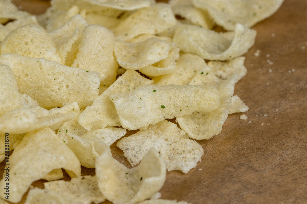 crispy potato chips with spices on the table crispy potato chips with spices on the table
