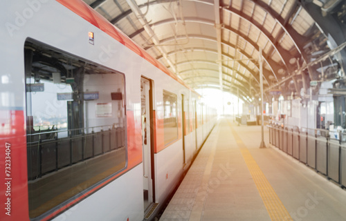 Cropped shot of train stop at railway station with sunset  photo taken in Rangsit Station  Bangkok