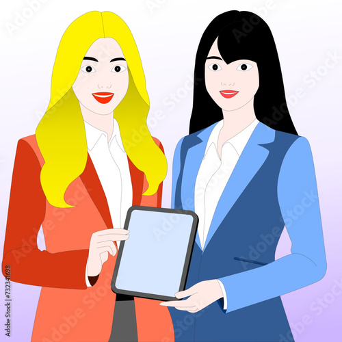 Two office ladies stand together holding tablets.