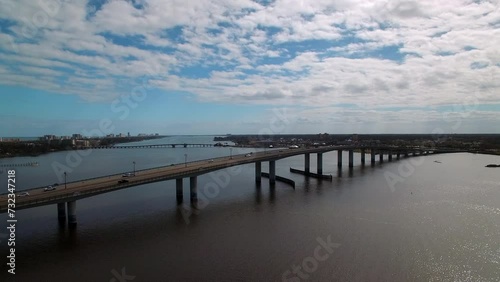 Wallpaper Mural Aerial Shot Of Cars Moving On Broadway Bridge Road, Drone Flying Backwards Over Halifax River During Sunny Day - Daytona Beach , Florida Torontodigital.ca