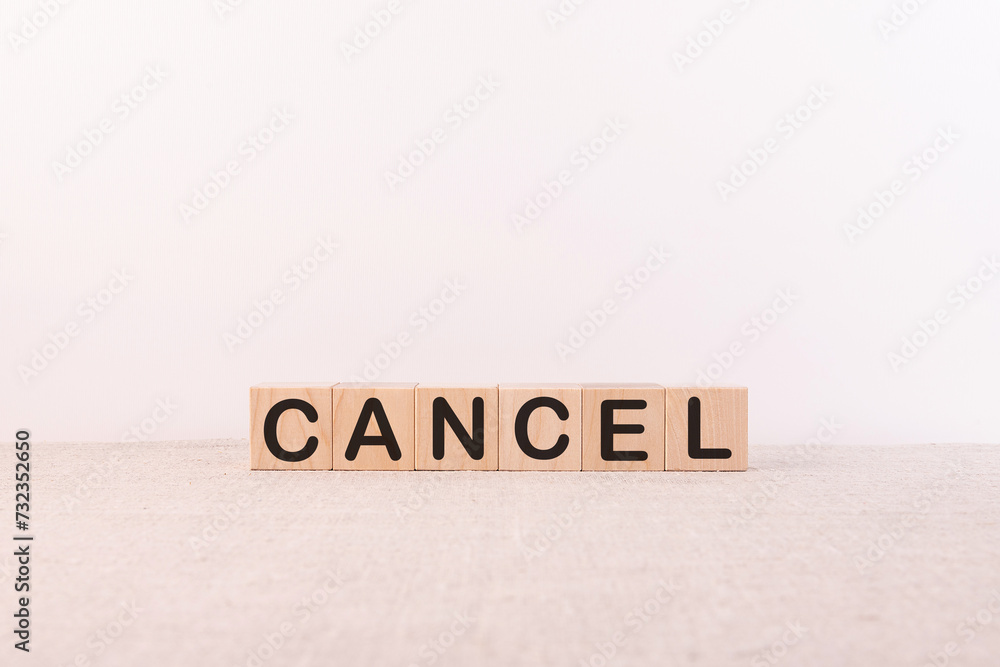 CANCEL word made with building blocks, business concept CANCEL word made with building blocks, business concept