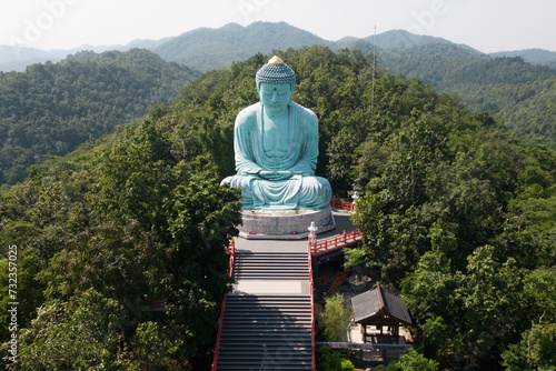 Vászonkép Outdoor great Buddha Daibutsu or Amitabhe Buddha at Wat Pra That Doi Pra Chan