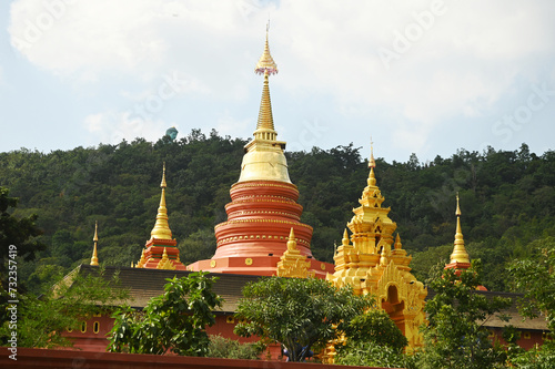 Outdoor golden pagoda Wat Phra That Doi Phra Chan is a temple located on a secluded mountain called Doi Phra Chan, offering beautiful views and scenery. Located at Lampang Province in Thailand.