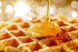Indulge in a mouth-watering snack as you savor the rich flavors of a buttery belgian waffle drizzled with sweet syrup, a perfect dish for a cozy indoor treat