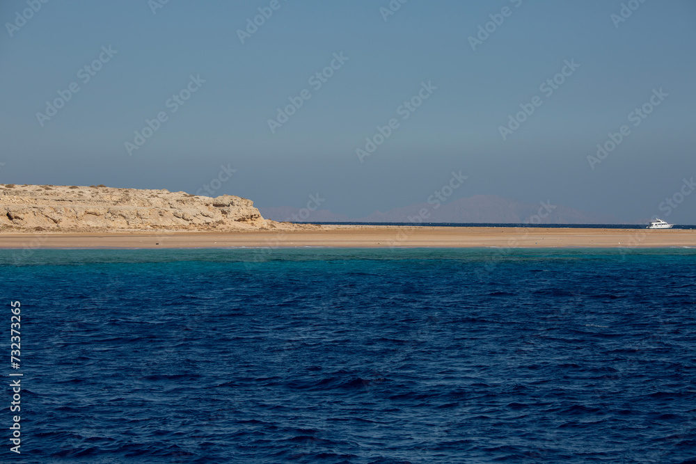 View of the Red Sea, turquoise water color and sandy beach, beauty of nature