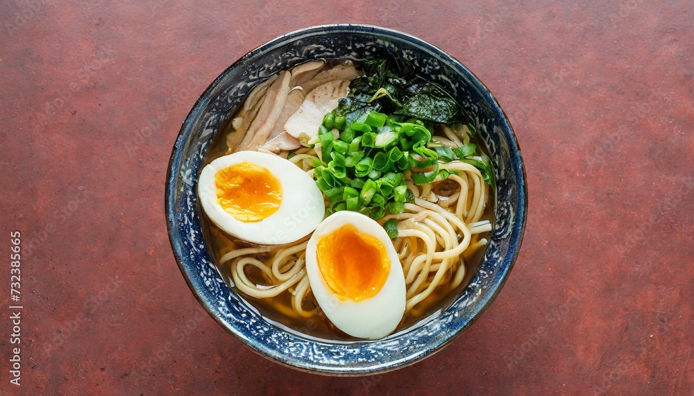 Asian Cuisine - Japanese Ramen or Noodle Soup with Broth and vegetables - Set on a Table with chopsticks Asian Cuisine - Japanese Ramen or Noodle Soup with Broth and vegetables - Set on a Table with chopsticks
