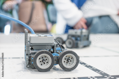 robot competitions, children control robots. High quality photo