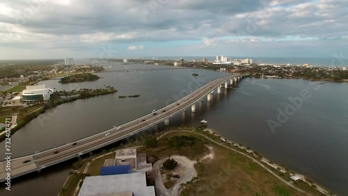 Wallpaper Mural Aerial Panning Beautiful View Of Segmental Bridge Over River Under Cloudy Sky - Daytona Beach , Florida Torontodigital.ca