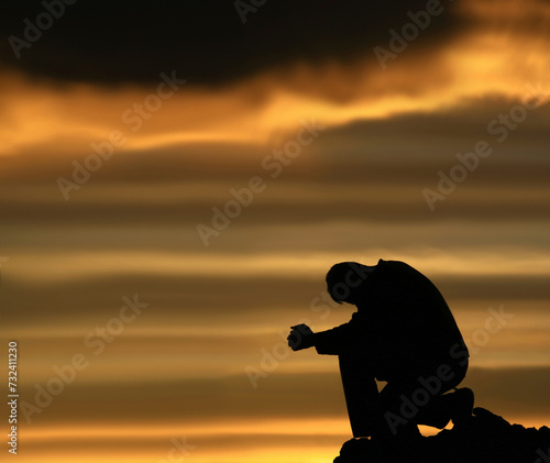 silhouette of a person with sunset