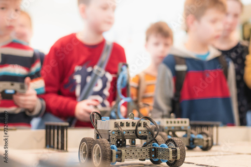 robot competitions, children control robots. High quality photo photo