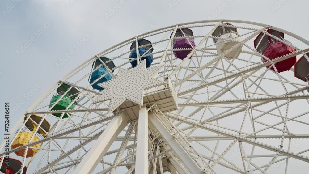 Ferris Wheel leisure attraction on amusement park in the city Ferris Wheel leisure attraction on amusement park in the city