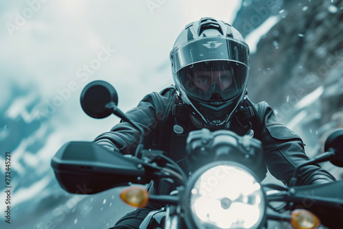 Close-up of a motorcyclist geared up and riding through a mountain pass, focus on the determination in the rider's posture, blurred background emphasizing speed and adventure © Nii_Anna