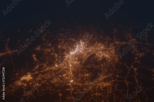 Aerial shot on Tbilisi (Georgia) at night, view from east. Imitation of satellite view on modern city with street lights and glow effect. 3d render photo