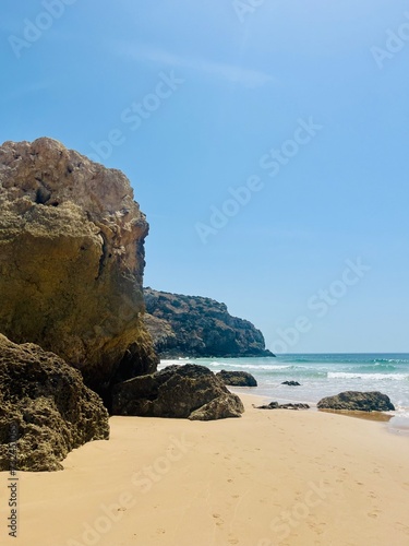 rocky coast of the ocean, rocks at the ocean beach, ocean horizon