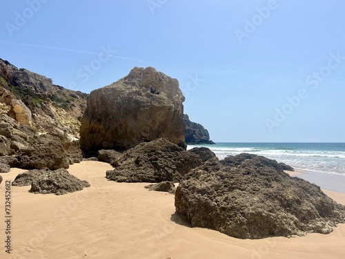 rocky coast of the ocean, rocks at the ocean beach, ocean horizon