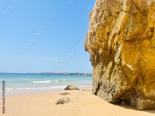 rocky coast of the ocean, rocks at the ocean beach, ocean horizon