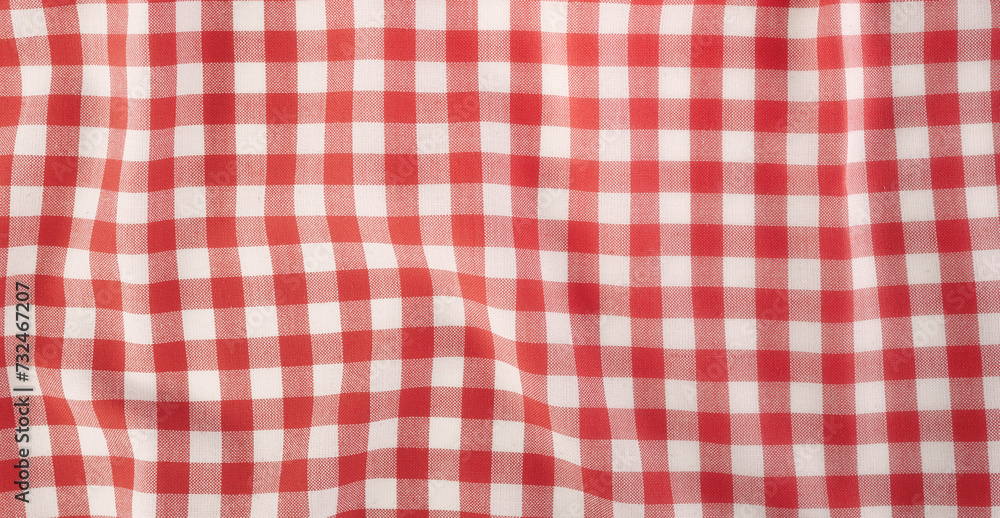 Red picnic cloth checkered pattern texture,background. Recipe, menu backdrop.Checked textile. Red picnic cloth checkered pattern texture,background. Recipe, menu backdrop.Checked textile.