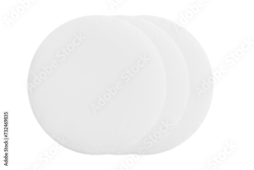 Cotton round cosmetic sponges on a blank background