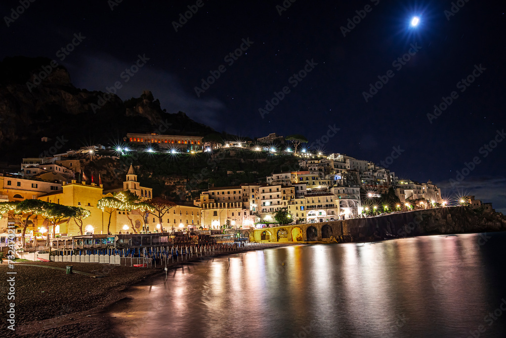 the light show that the small village of Amalfi offers at night