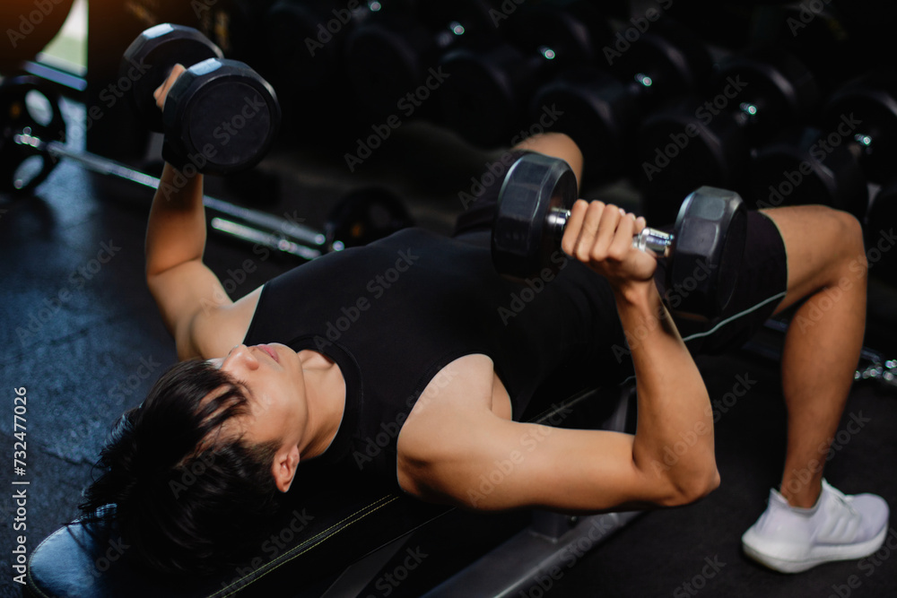 Exercise with dumbbells Lift weights to build strong arm muscles, an activity for good physical health.