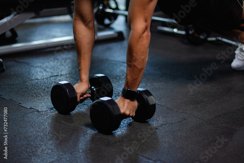 Exercise with dumbbells Lift weights to build strong arm muscles, an activity for good physical health.