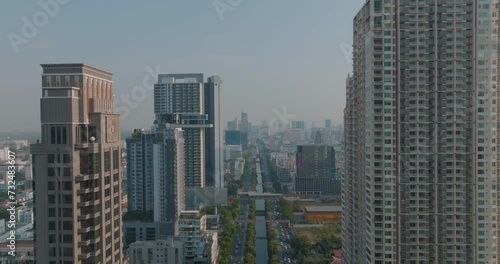 Aerial view modern city office building city park with transport road Bangkok Thailand photo