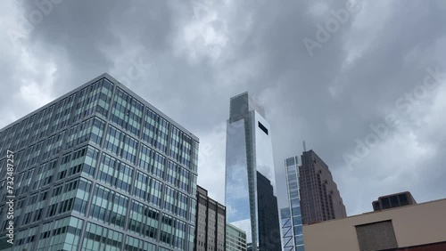 Low angle of Comcast Center Skyscraper in Philadelphia, Pennsylvania under dramatic cloudy sky photo