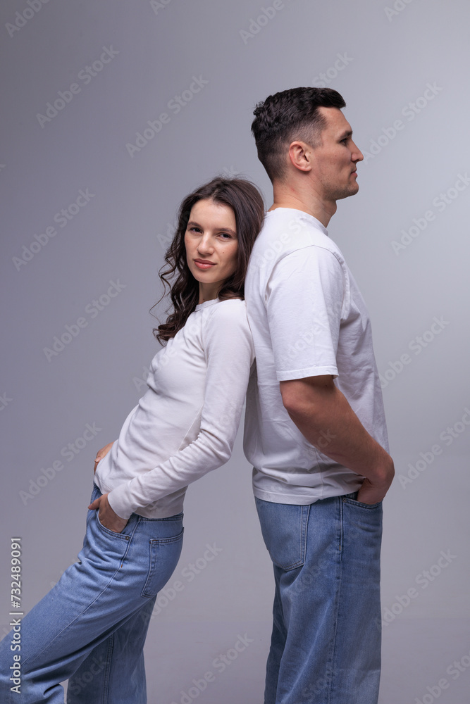 This captivating minimalist portrait features a couple in a quiet embrace, bathed in soft light. This captivating minimalist portrait features a couple in a quiet embrace, bathed in soft light.