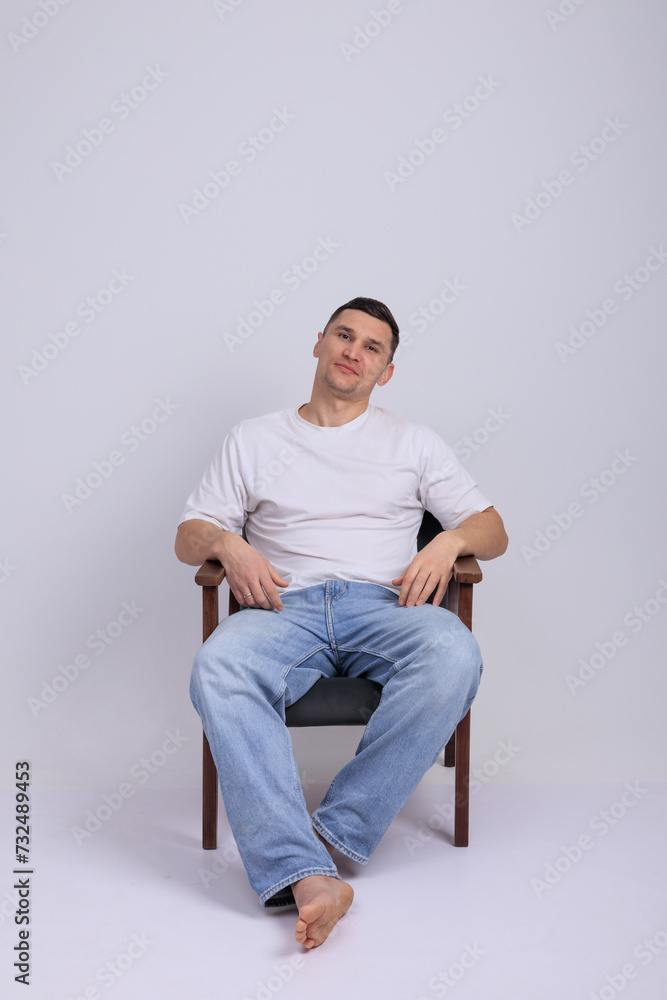 In this captivating minimalist portrait, a man emanates strength and quiet confidence. In this captivating minimalist portrait, a man emanates strength and quiet confidence.